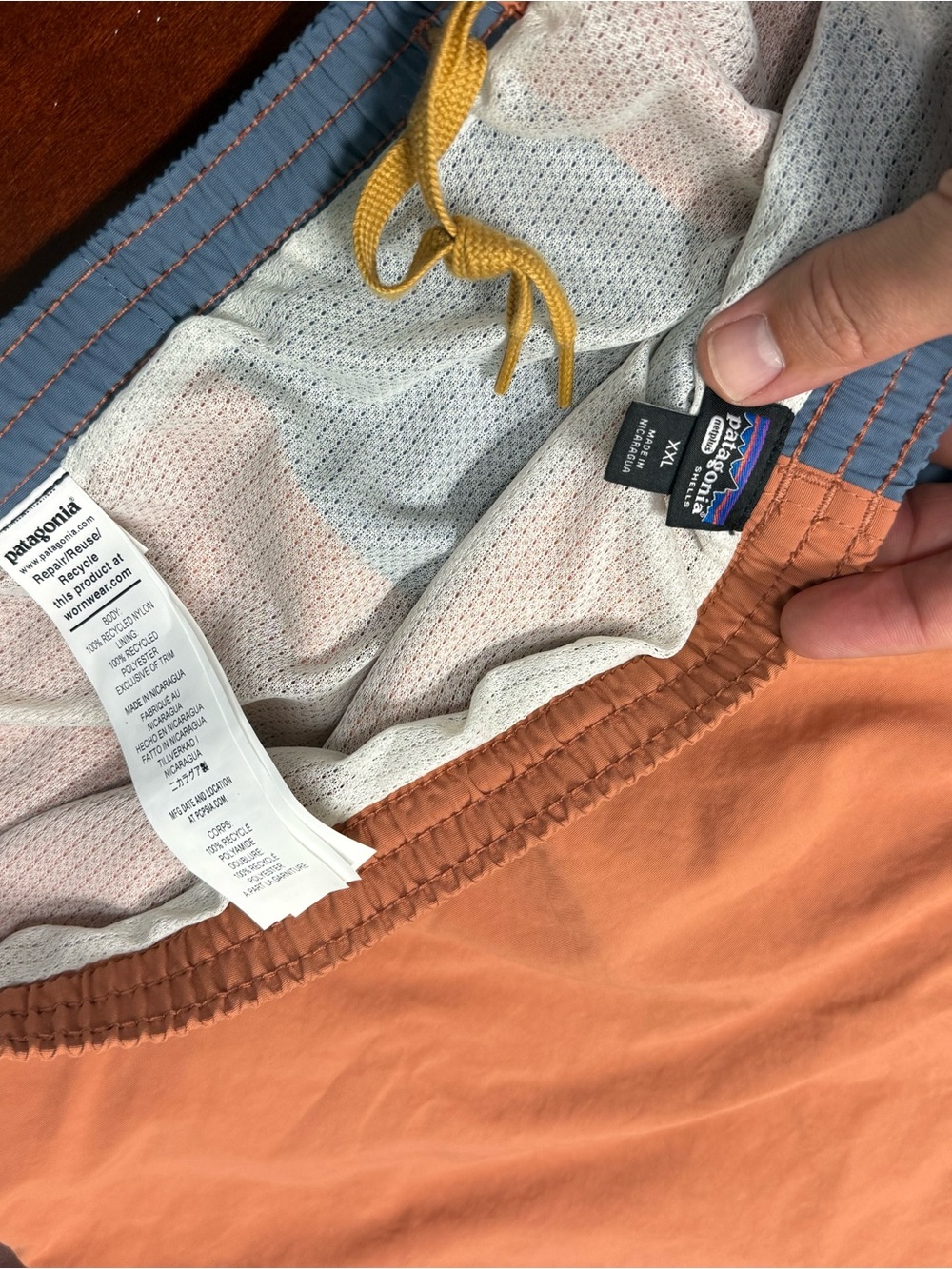 Patagonia Rust Orange Board Shorts with Slate Blue Waistband